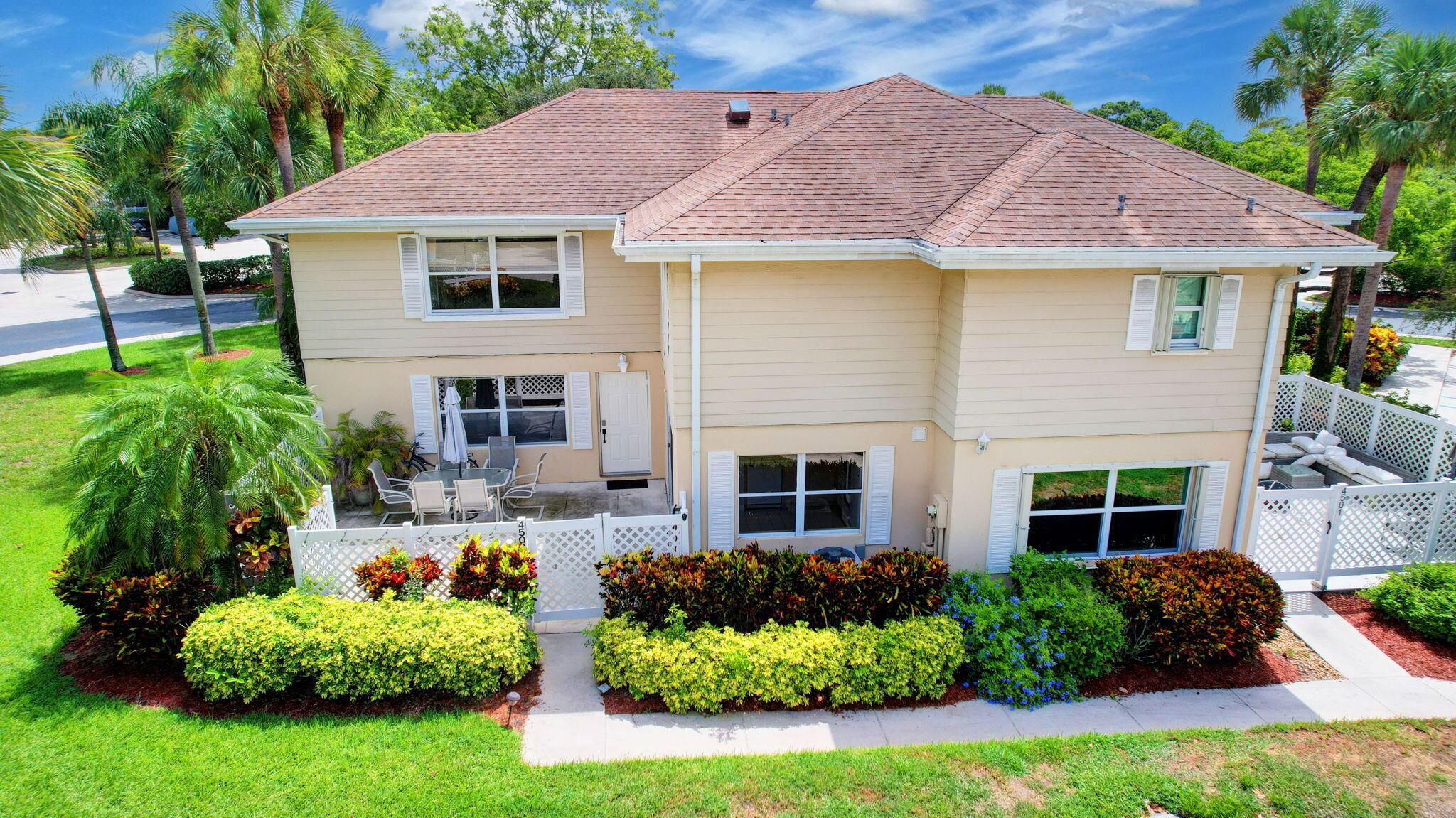 Large beautifully maintained 2 bedroom 2.5 bathroom Townhouse in prime location! The home enjoys 2 primary en-suites, an abundance of light, laminate wood-look flooring, large living area, large kitchen, expansive outdoor patio and a gated secure all ages community. For added convenience the home comes fully equipped with washer and dryer. Close to major highways and many of the regions best shopping, restaurants, hospitals and beaches! Don't miss out!