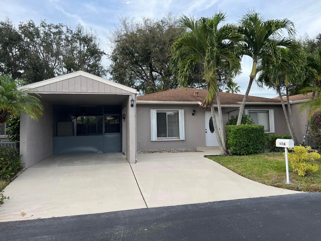 Photo of 14704 Wildflower Lane, Delray Beach, FL 33446 (MLS # R11160654)