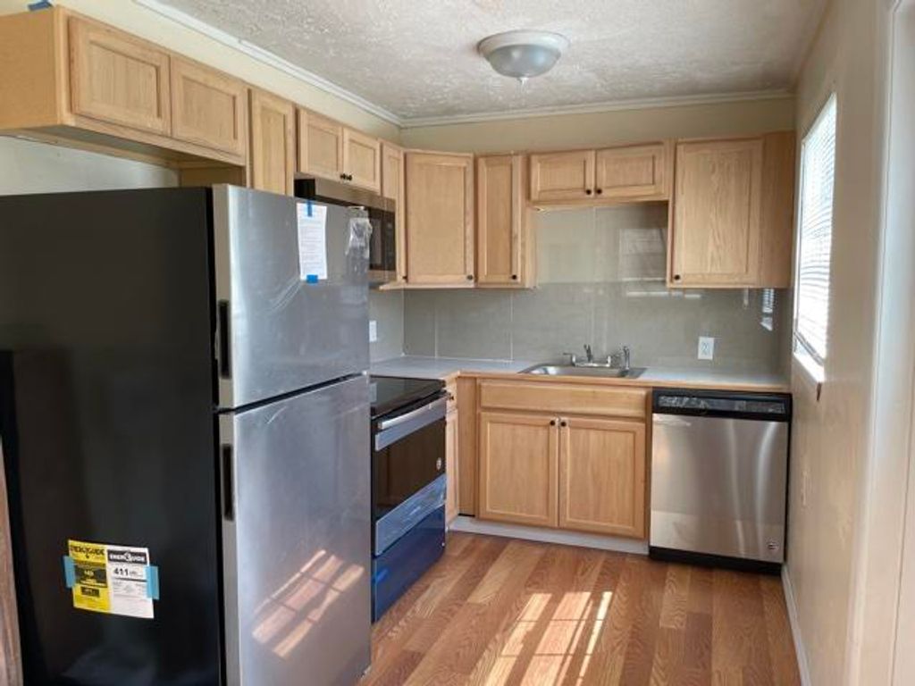 Photo of 1425 W 30th Street, Riviera Beach, FL 33404 (MLS # B26011339)