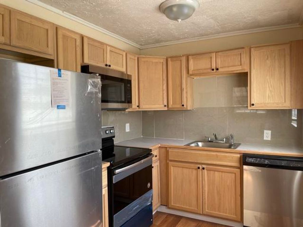 Photo of 1425 W 30th Street, Riviera Beach, FL 33404 (MLS # B26011339)