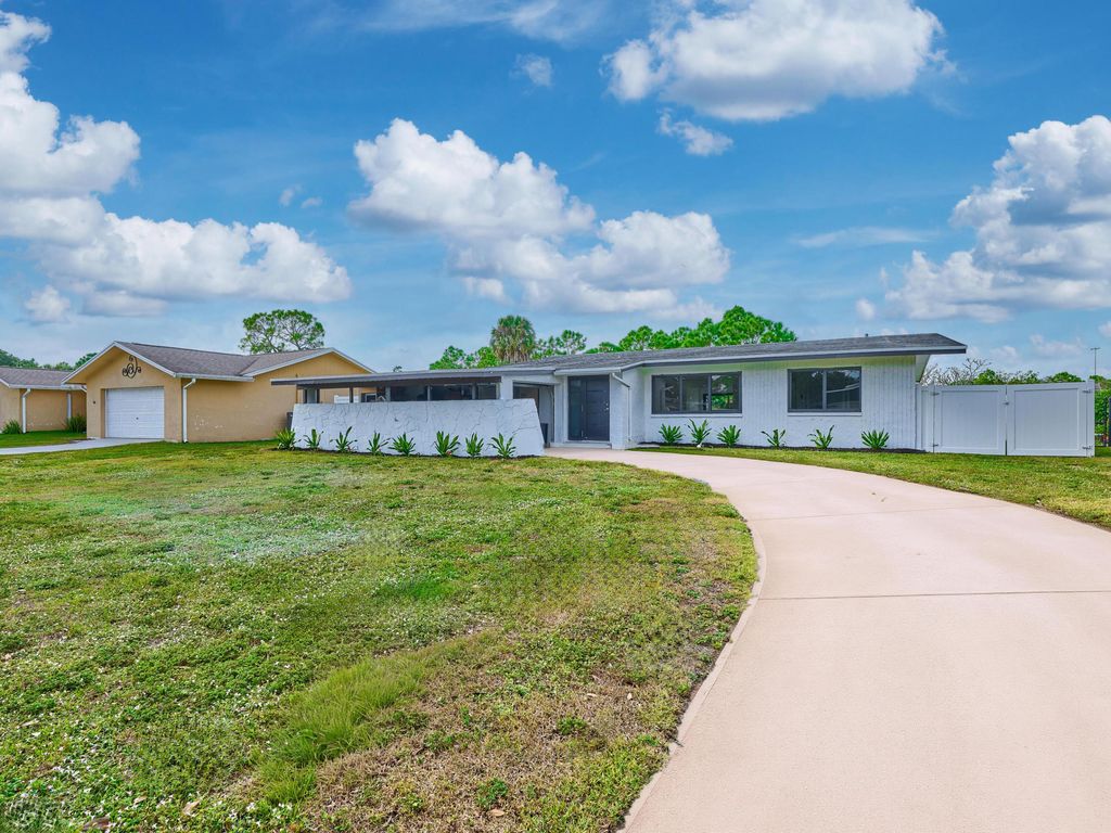 Photo of 197 Sandpiper Avenue, Royal Palm Beach, FL 33411 (MLS # R11149071)