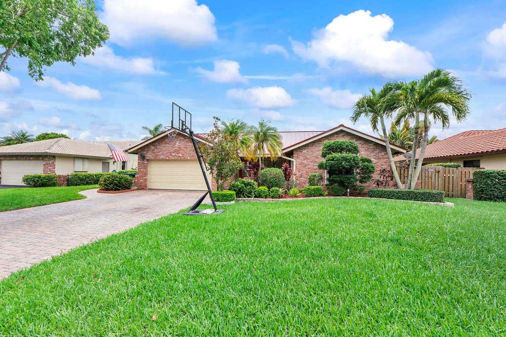 Photo of 10662 NW 7th Place, Coral Springs, FL 33071 (MLS # B26048011)