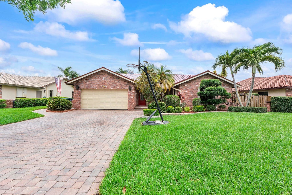 Photo of 10662 NW 7th Place, Coral Springs, FL 33071 (MLS # B26048011)