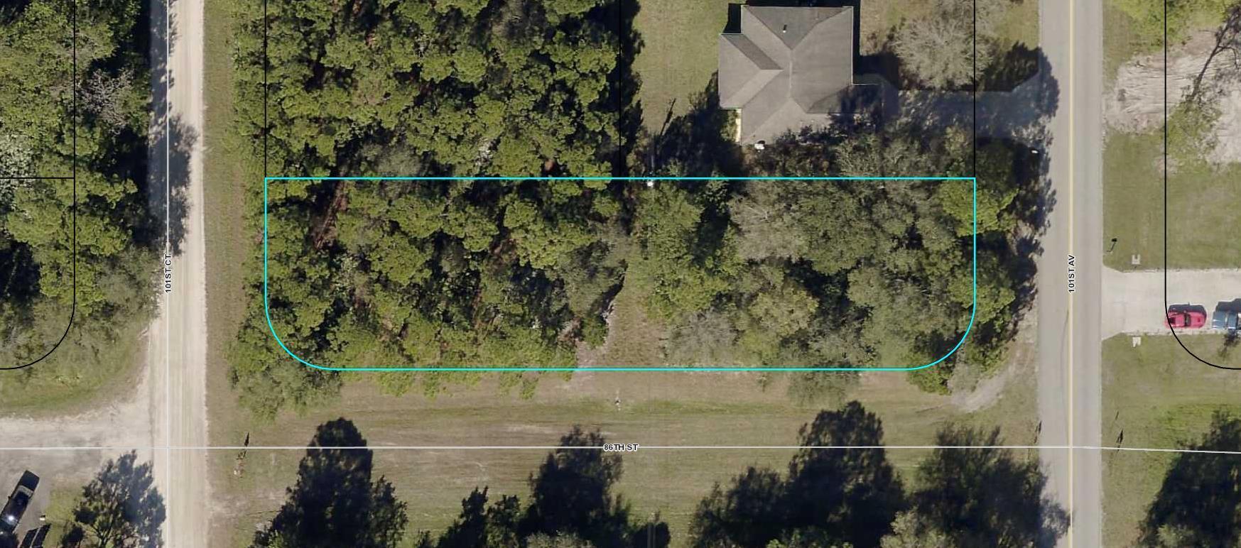 Corner lot in Vero Lake Estates providing two corner lots side by side length wise under one address. One of the corner lots sides to a paved road. Property located minutes to shopping, aquatics center and I-95 highway for commute. Buy and build or hold for investment.