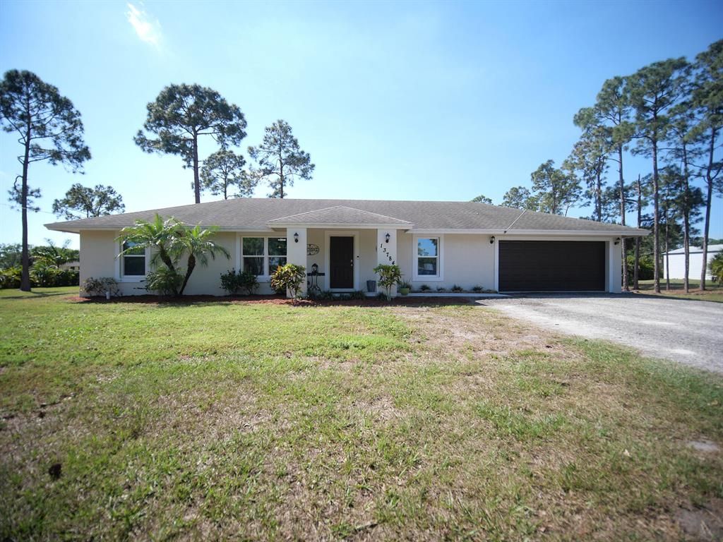 Photo of 13784 63rd Lane N, West Palm Beach, FL 33412 (MLS # R10874703)