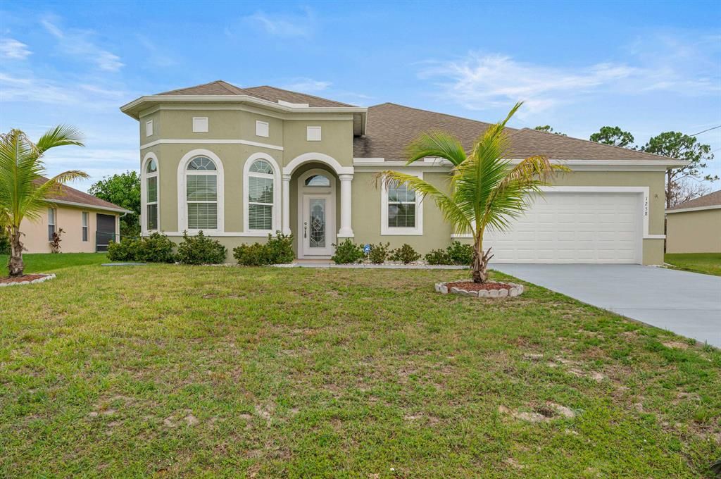 Photo of 1258 SW Emerald Avenue, Port St Lucie, FL 34953 (MLS # R10864722)