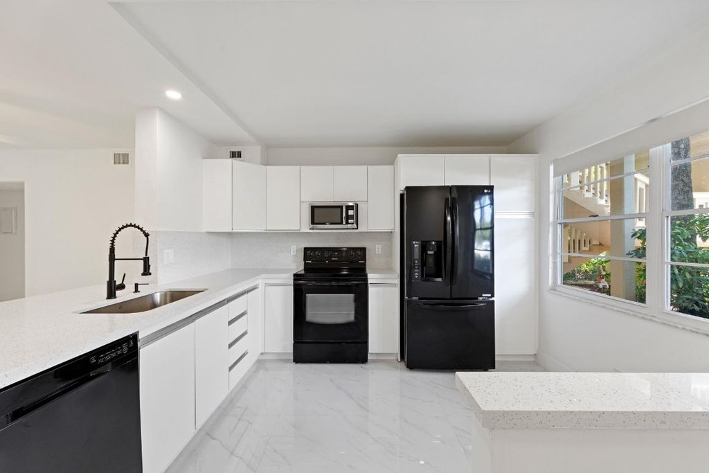 Photo of 2202 Lucaya Bend #M1, Coconut Creek, FL 33066 (MLS # F10548861)