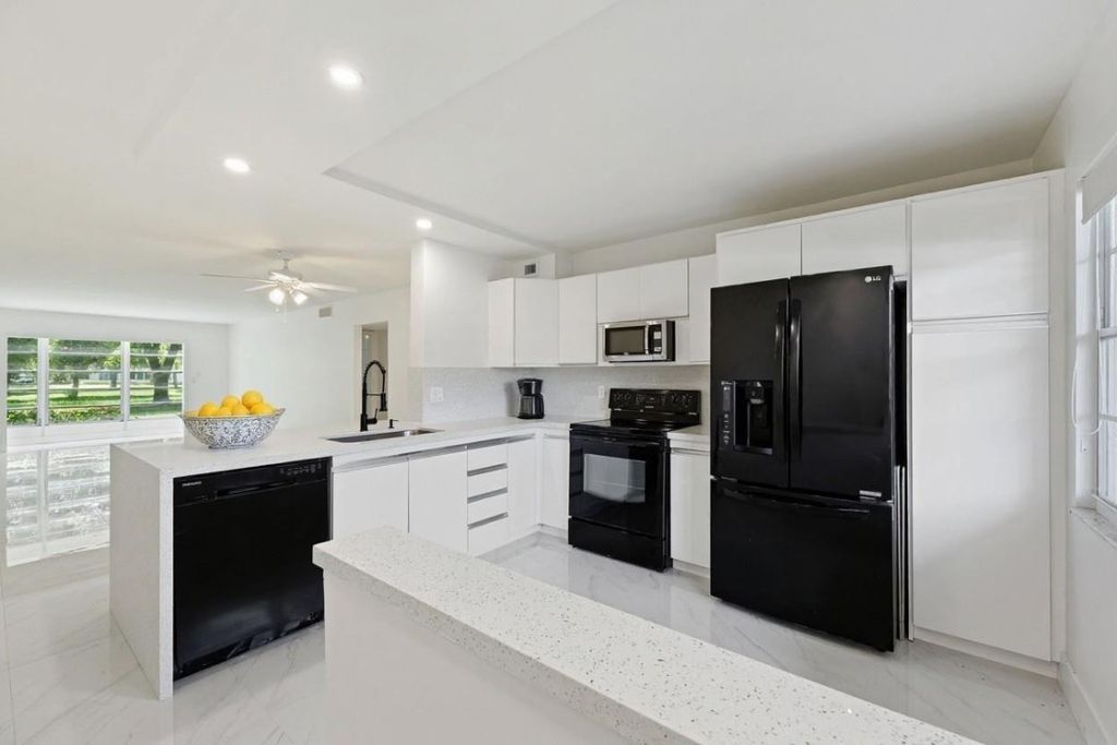 Photo of 2202 Lucaya Bend #M1, Coconut Creek, FL 33066 (MLS # F10548861)