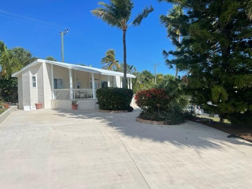 Photo of 900 Juno Ocean Walk #A87, Juno Beach, FL 33408 (MLS # R10981167)