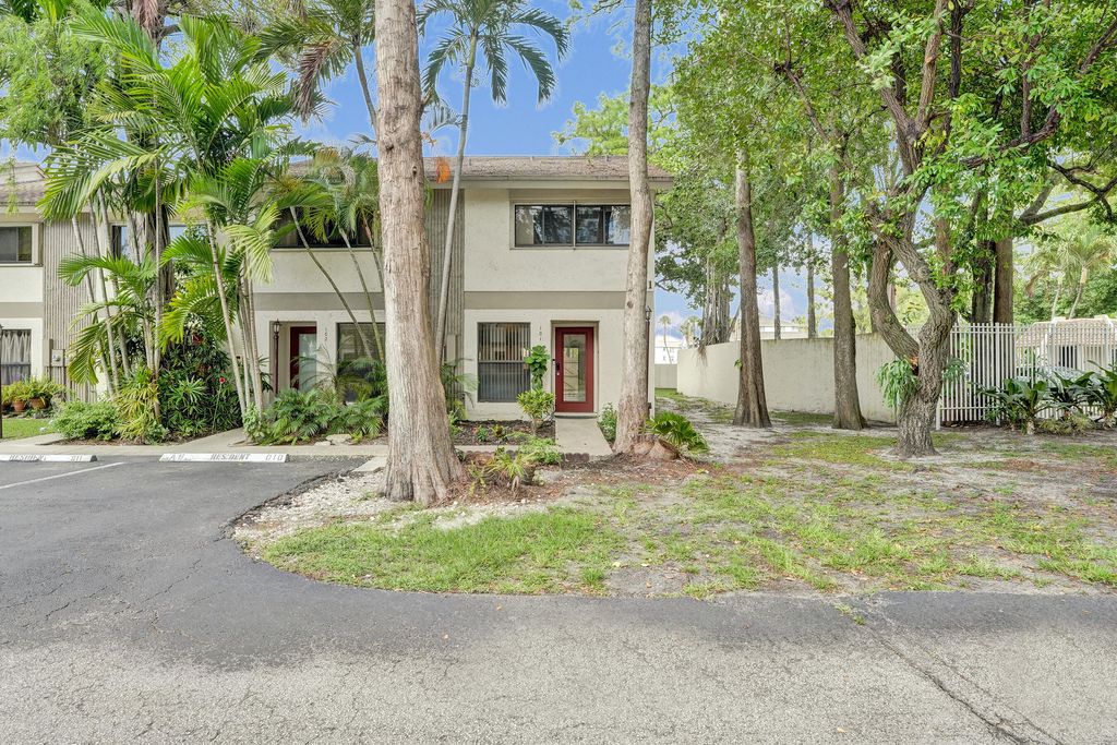 Photo of 3080 S Oakland Forest Drive #101, Oakland Park, FL 33309 (MLS # B26032095)