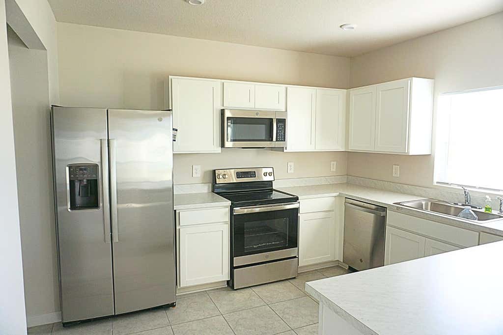 Photo of 606 Lychee Lane, Fort Pierce, FL 34981 (MLS # R11043851)