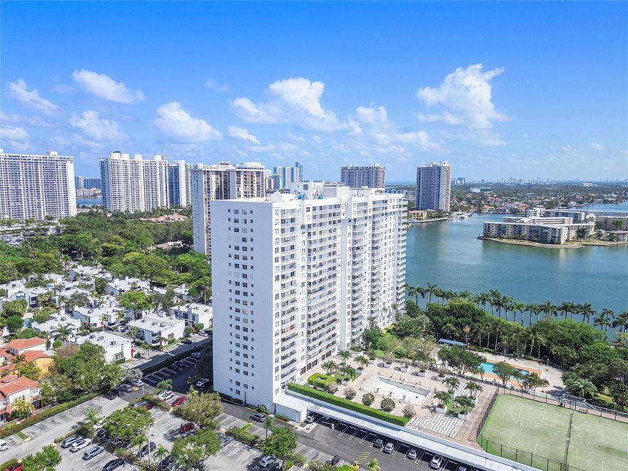 Beautiful and spacious 2-bedroom, 2-bath condo in the heart of Aventura! Pretty water views of Maule Lake and beautiful sunsets !! This light-filled unit features a desirable split-bedroom layout, updated bathrooms, and ceramic tile flooring throughout. The kitchen is equipped with white cabinetry, stainless steel appliances, and ample storage. Both bedrooms are generously sized with walk-in closets and plenty of additional storage space. Enjoy serene water views from your balcony—perfect for relaxing or entertaining. Ideally located just minutes from the beach, shopping, dining, and all that Aventura has to offer! 40 year certification was completed and assessment will be paid in full at closing. No rentals allowed the first 2 years of ownership.