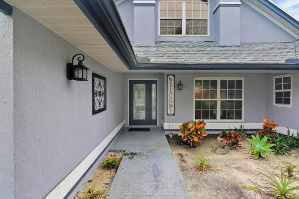 Photo of 2062 SE Crowberry Drive, Port Saint Lucie, FL 34983 (MLS # R10972767)