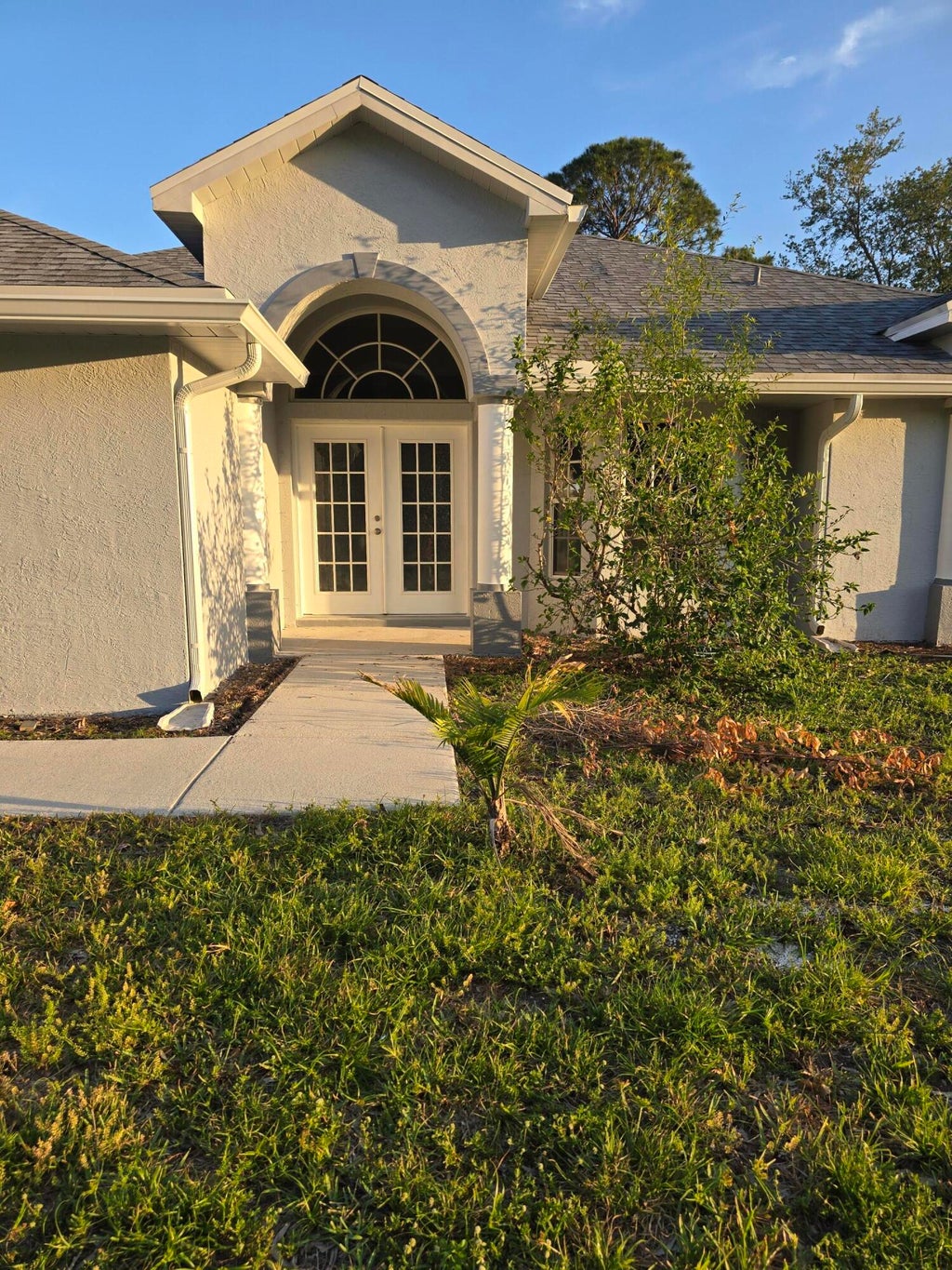 Photo of 502 SW Souris Avenue, Port Saint Lucie, FL 34953 (MLS # B26049636)