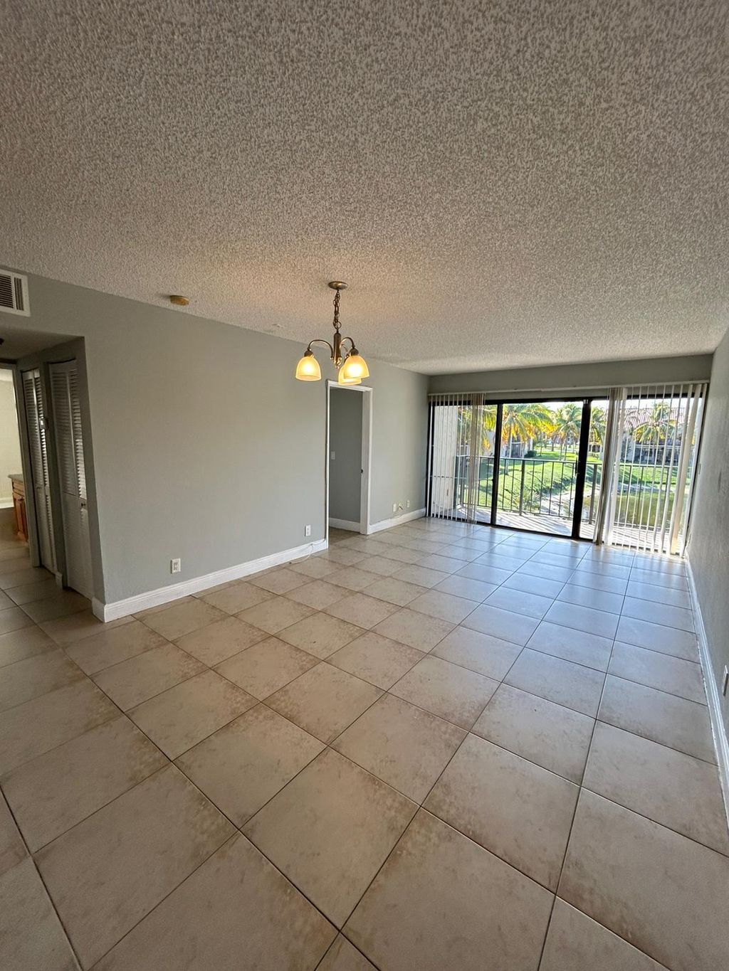 Photo of 1493 Lake Crystal Drive #F, West Palm Beach, FL 33411 (MLS # R11161933)