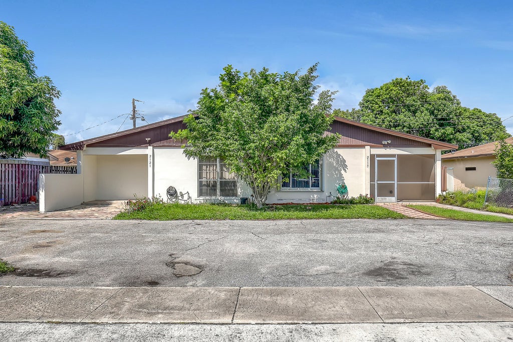 Photo of 2117 E Bond Drive #1, West Palm Beach, FL 33415 (MLS # B26080254)