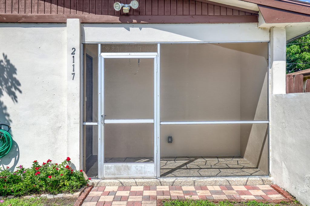 Photo of 2117 E Bond Drive #1, West Palm Beach, FL 33415 (MLS # B26080254)
