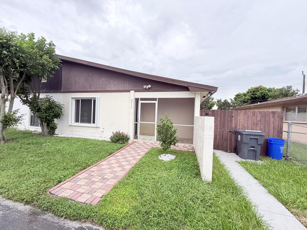 Photo of 2117 E Bond Drive #1, West Palm Beach, FL 33415 (MLS # B26080254)