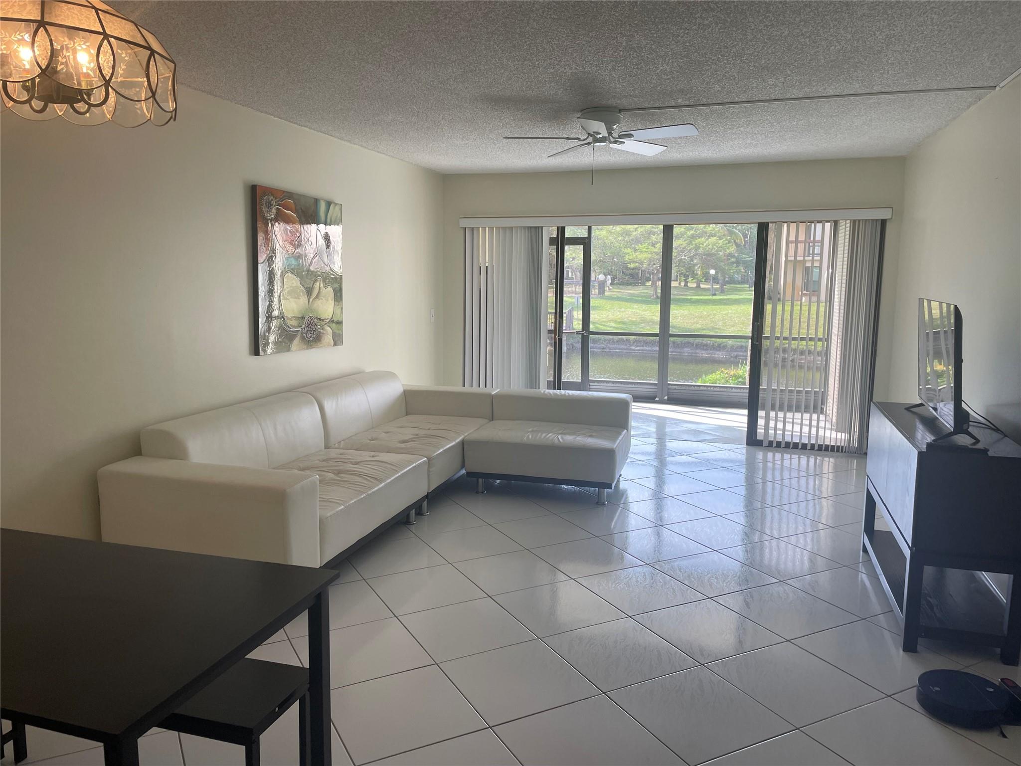 COME TO PARADISE! BEAUTIFUL TWO BEDROOMS TWO BATHROOMS CONDO WITH A PEACEFUL LAKE VIEW FROM BEDROOM AND LIVING ROOM. RECENTLY PAINTED THROUGHOUT. GREAT LOCATION NEAR 1-95, TURNPIKE, SAWGRASS, RESTAURANTS, AND ONLY 15 MINUTES FROM THE AWARD WINNING DEERFIELD BEACH. GREAT VIEWS AND LOCATION!