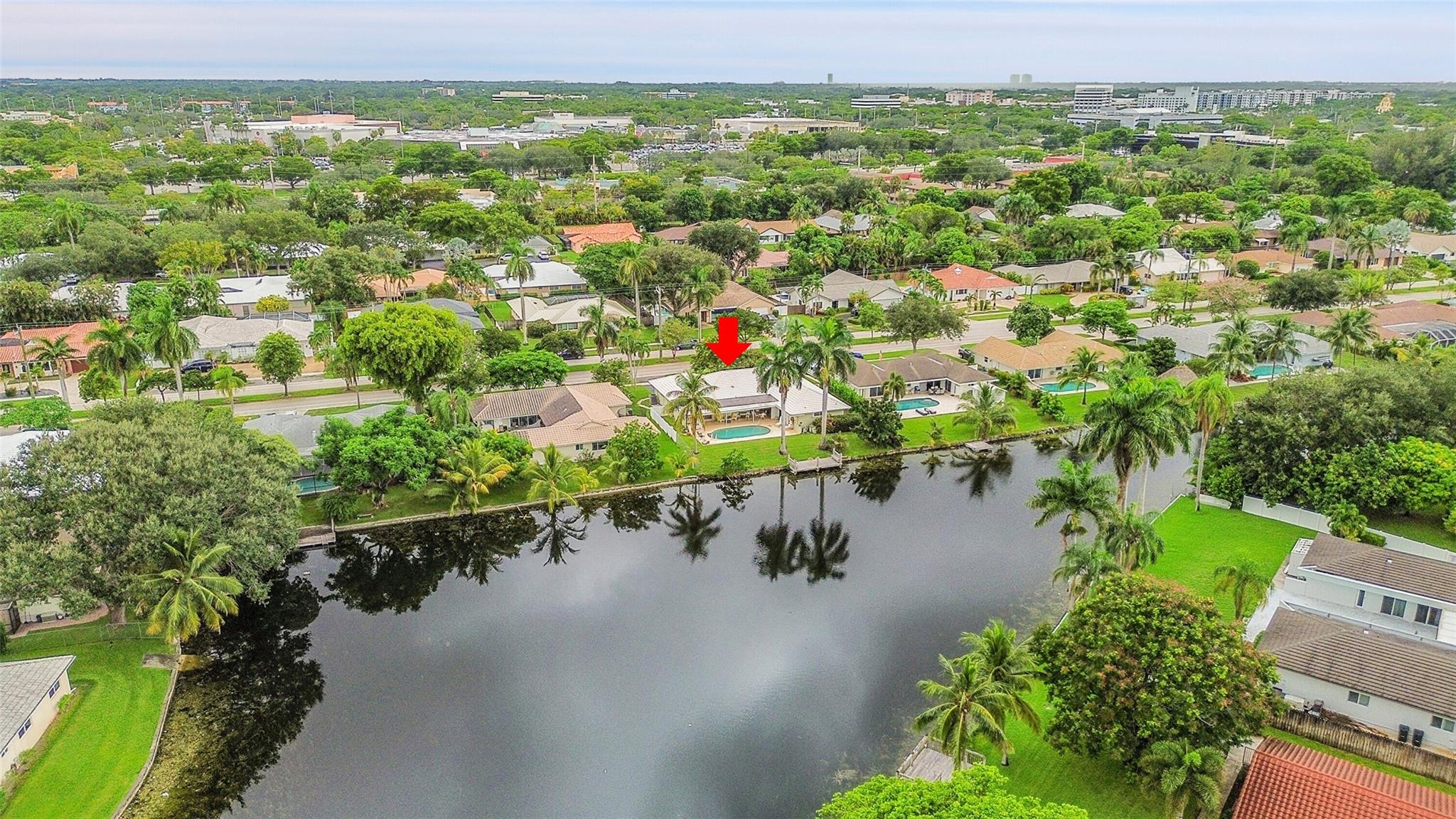 EL Dorado Estates Plantation’s most sought after community, on a prime lot with breathtaking water views. The property features a private dock, perfect for paddle boarding, kayaking, or simply enjoying serene sunsets. The kitchen overlooks the lake, showcasing quartz countertops and lots of space. Accordion hurricane shutters and a newer roof provideing peace of mind! While the home invites a new owners personal updates, its in an exceptional location and it's a rare opportunity to make it yours!! in a gated community known for its charm and convenience. Homes with wide lake views and docks in EL Dorado Estates, are highly desirable, especially at this unbeatable price!! So don’t miss your chance to transform this home, into the lifestyle you’ve been waiting for. We cant wait to show you!!