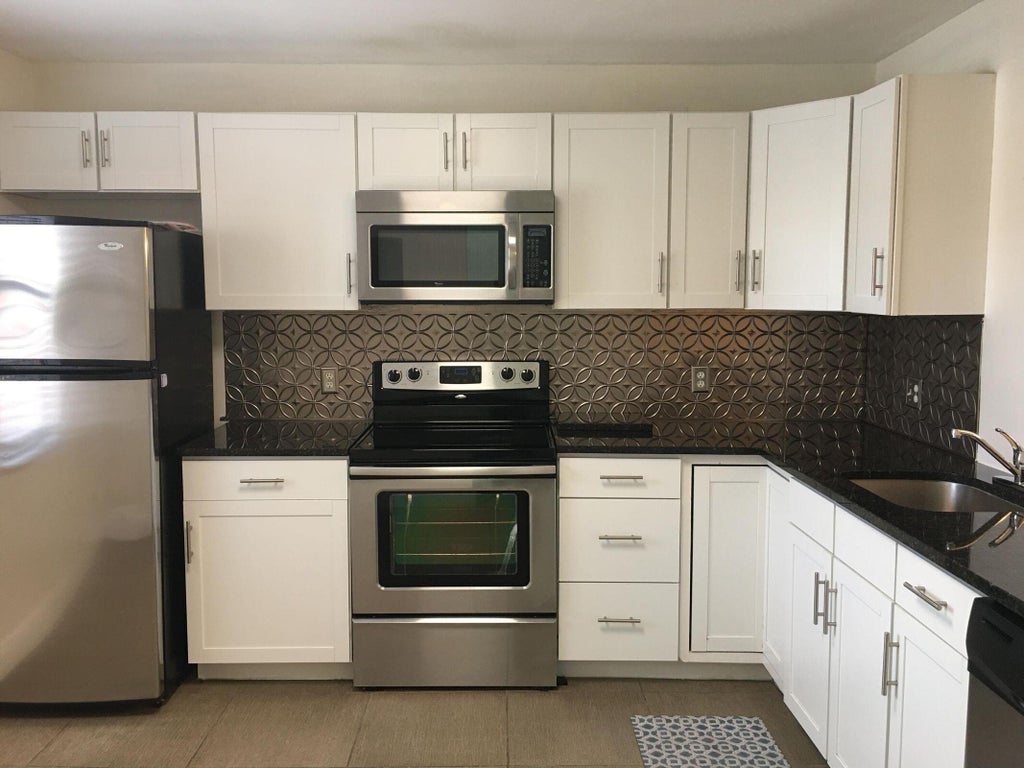 Photo of 2007 W LAKEVIEW Drive W, Royal Palm Beach, FL 33411 (MLS # B26077865)