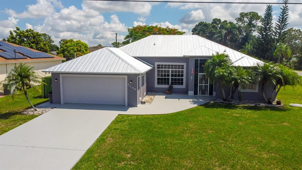 Photo of 2149 SW Savage Boulevard Blvd, Port St Lucie, FL 34953 (MLS # R10825918)
