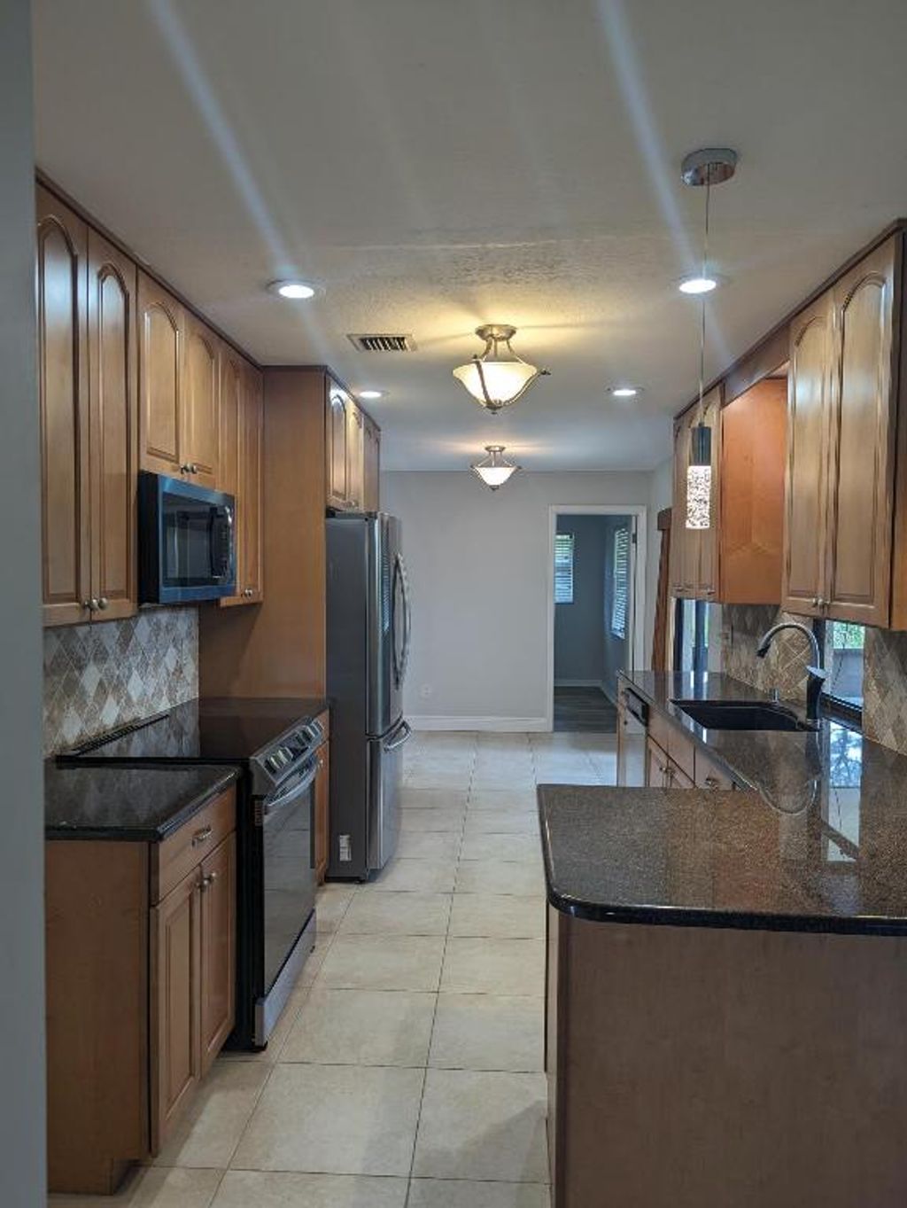 Photo of 2454 SE Pascal Avenue, Port Saint Lucie, FL 34952 (MLS # R10959827)