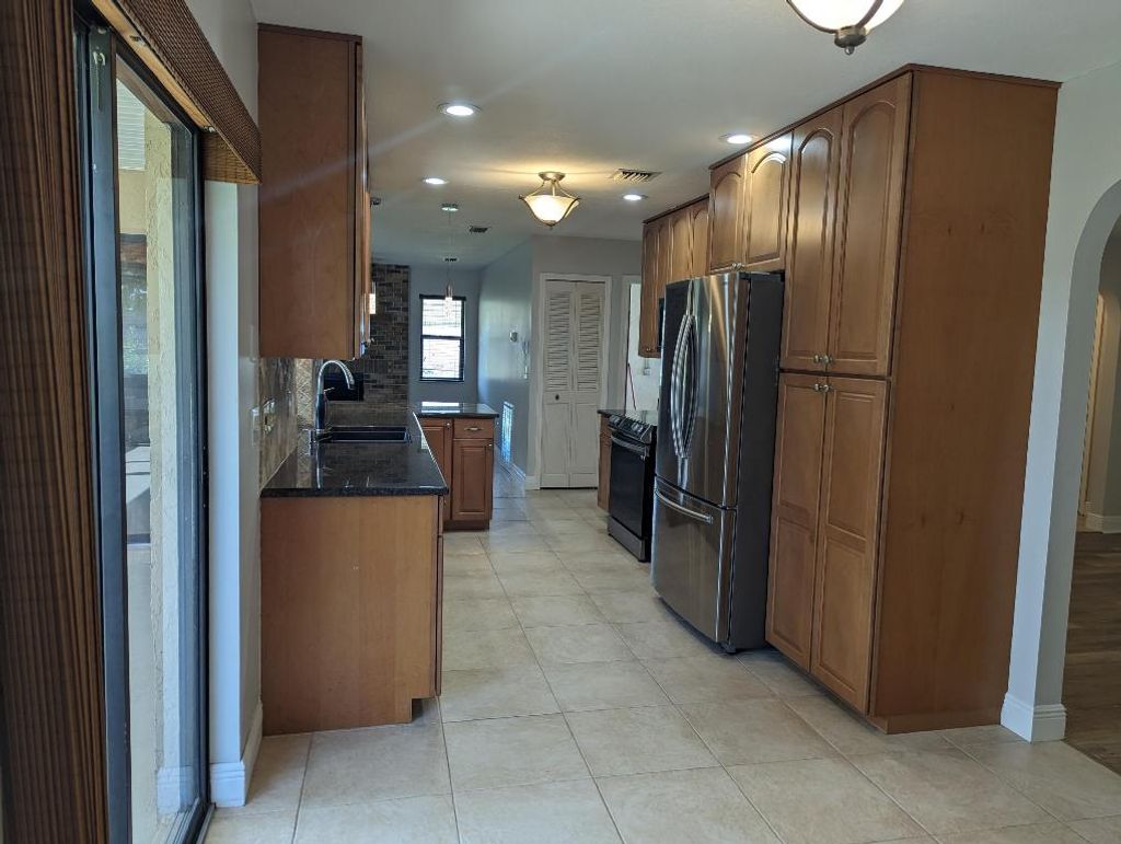 Photo of 2454 SE Pascal Avenue, Port Saint Lucie, FL 34952 (MLS # R10959827)