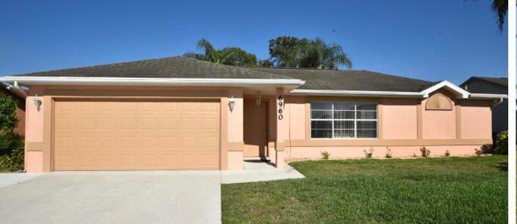 Photo of 6960 NW Hartney Way Way, Port St Lucie, FL 34983 (MLS # R10806135)