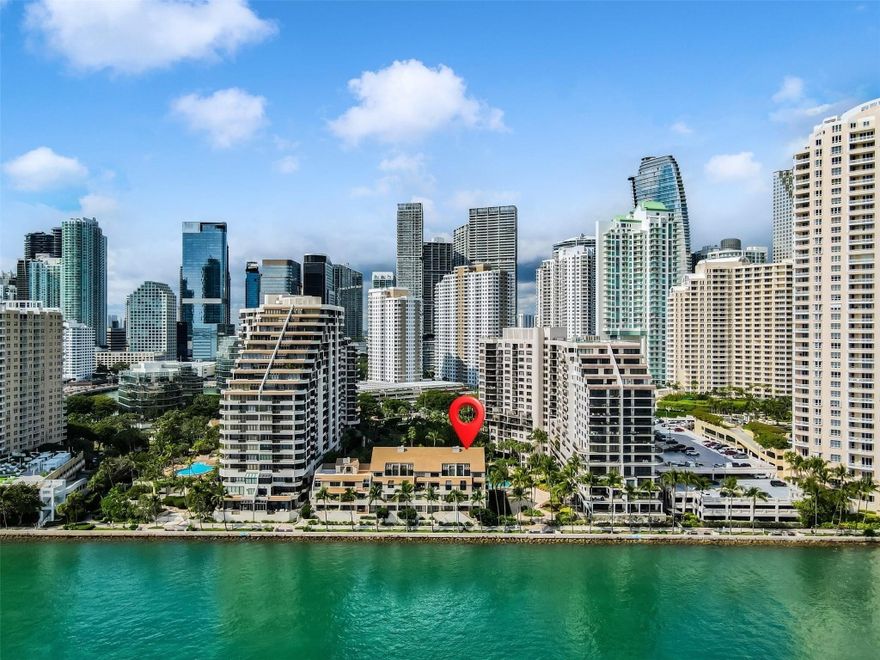 TWO-STORY LUXURY VILLA on exclusive Brickell Key with unobstructed OCEAN VIEWS... Now fully complete, this TOTAL GUT RENOVATION has transformed this unique BAY HOME into a masterpiece of brand-new construction. This 3 BEDROOM, 3.5 BATH  2500+ SQ FT. residence was rebuilt from the studs with BRAND NEW core systems: electrical, plumbing, and high-efficiency HVAC with linear vents for dramatically raised ceilings. Features: HIGH IMPACT glass, 30x60 porcelain floors, custom millwork, and a chef's kitchen with a full Thermador suite. All closets, railings, fixtures and finishes are of the highest quality,  complemented by a newly refinished PRIVATE ELEVATOR. This rare, TROPHY PROPERTY combines elite oceanfront privacy with Brickell’s unique, vibrant energy. 1 OF ONLY 6 BAY VILLAS on the island.