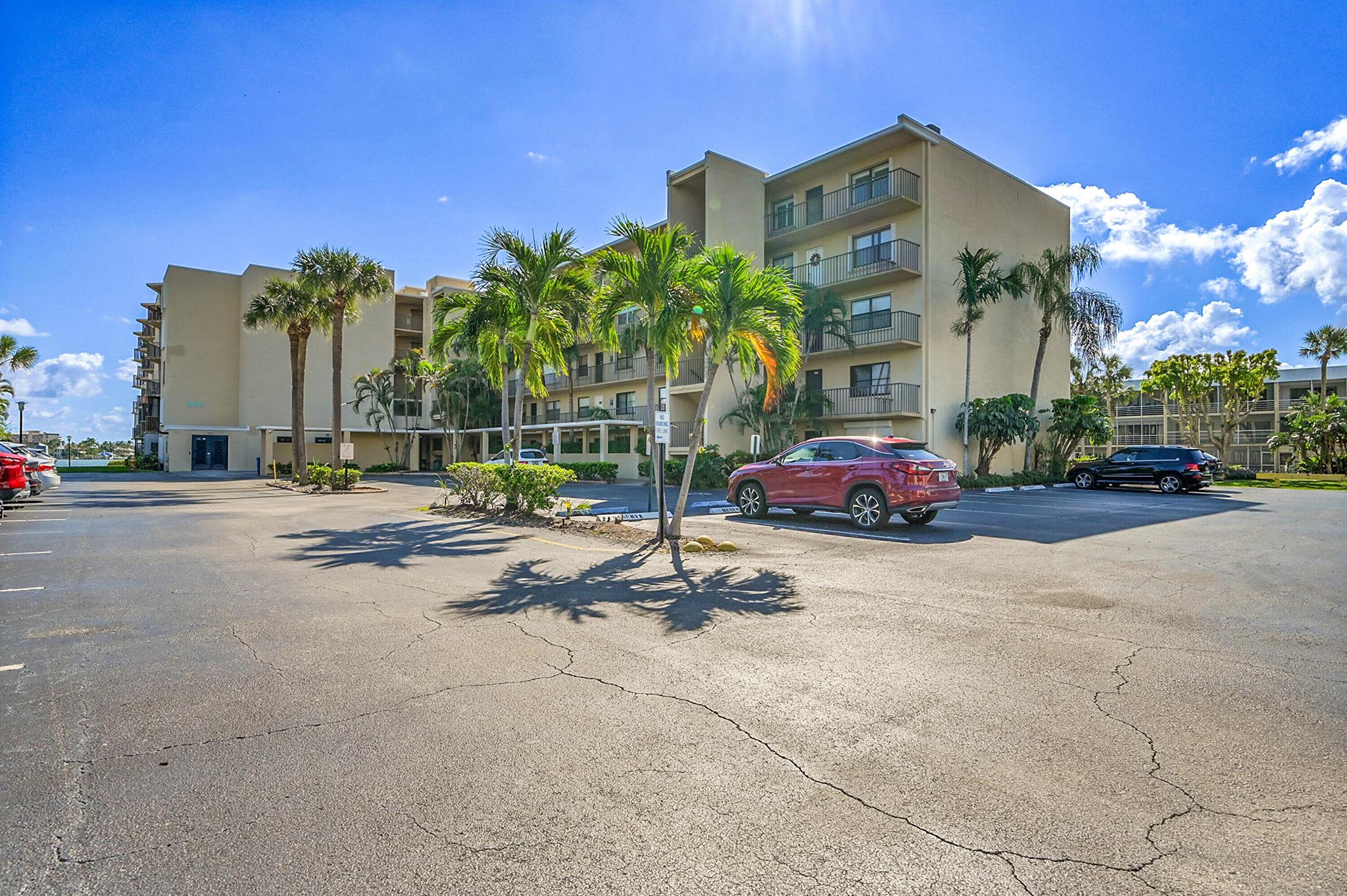 Breathtaking Intracoastal Views in Hidden Harbour of the Palm Beaches! Wake up to sparkling water views every day in this updated 2-bedroom, 2-bath condo located in the Hidden Harbour of the Palm Beaches. Perfectly positioned just two doors in from the Intracoastal and perched on the 4th floor, this residence captures the essence of South Florida living -- with sweeping, unobstructed views of the water from your private patio and master suite. Inside, you'll find an inviting open-concept layout designed for comfort and entertaining. The modern kitchen features stainless steel appliances, granite countertops, and updated cabinetry, seamlessly opening to the spacious living and dining area. On the patio you can sip your morning coffee while watching boats glide by or unwind with sunset skies