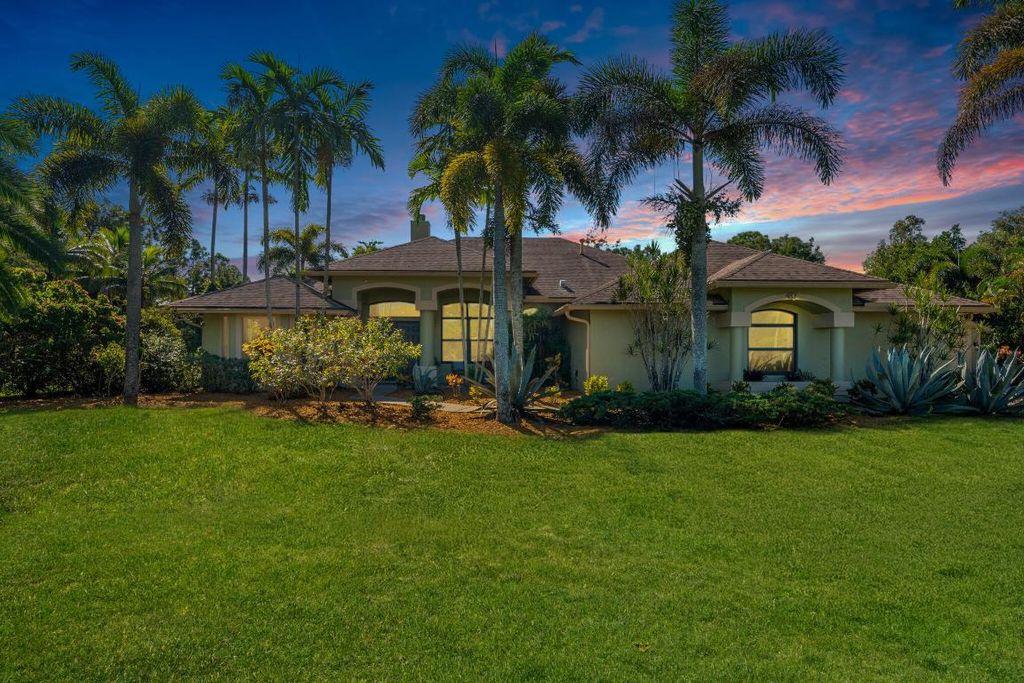 Photo of 17352 Valencia Boulevard, Loxahatchee, FL 33470 (MLS # R11136266)