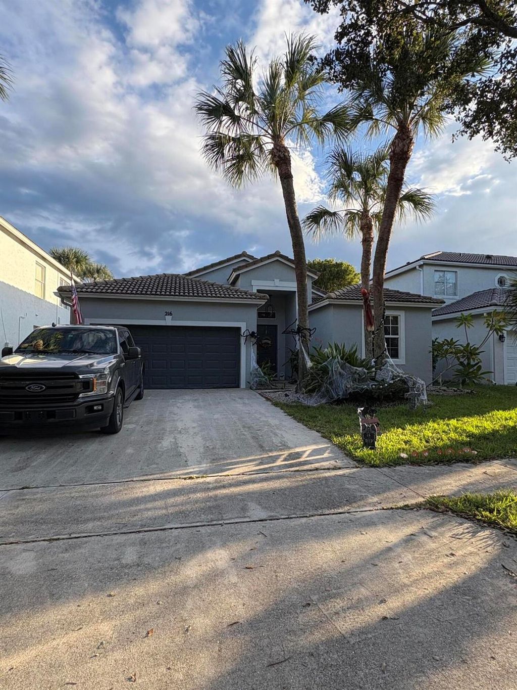 Photo of 216 Seminole Lakes Drive, Royal Palm Beach, FL 33411 (MLS # R11134697)