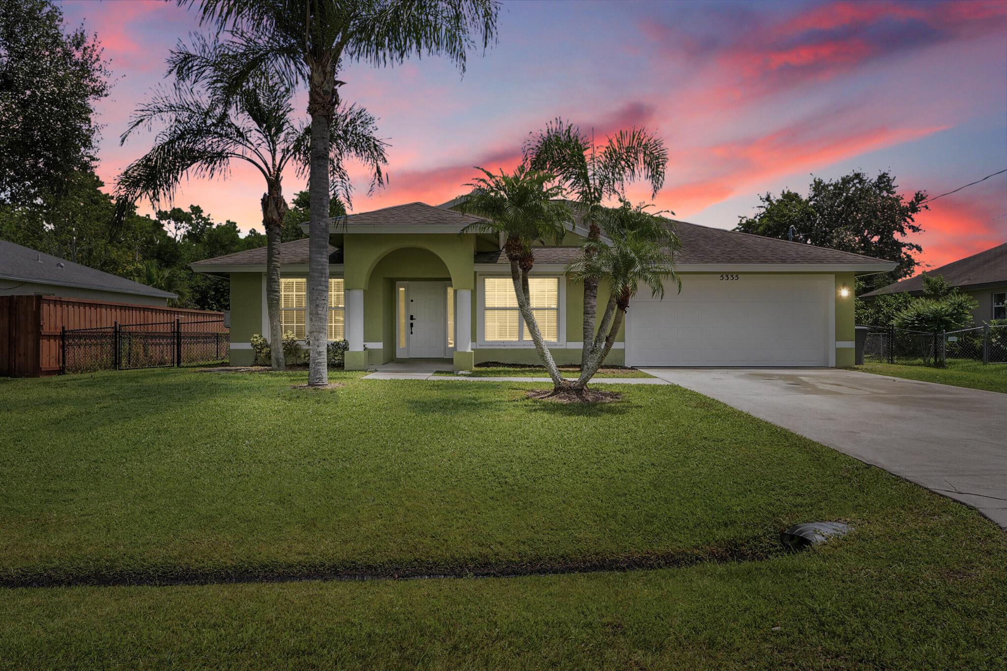 Welcome to 5335 NW Conley Drive! This beautifully maintained 3-bed, 2-bath pool home offers an open floor plan with vaulted ceilings, spacious kitchen, and plenty of natural light. The split-bedroom design provides privacy, while the primary suite features a walk-in closet and ensuite bath. Step outside to your screened-in pool and patio, perfect for entertaining or relaxing year round. With a 2-car garage and a prime Port St. Lucie location close to shopping, dining, and I-95, this home delivers the perfect blend of comfort and Florida lifestyle.