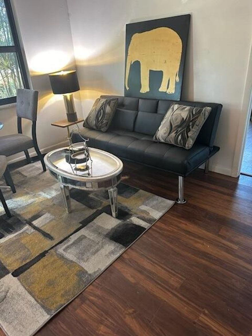 Experience the ultimate blend of modern living and rural tranquility in this stunning, detached efficiency. Tucked away on a massive 1.5-acre lot, this home offers a level of privacy and space that is rare to find. The interior is fresh, crisp, and brand new, featuring high-end hurricane impact windows that flood the space with natural light while providing peace of mind and energy efficiency. Whether you're looking for a serene retreat to unwind or a stylish home base, this move-in-ready unit is the perfect sanctuary for those who value quality and quiet. Step outside and embrace the freedom of a completely fenced-in estate, offering ample room to breathe and enjoy the lush surroundings of the Loxahatchee area. This unique gem won't stay on the market for long, so secure your private tour today and see why this is the upgrade you've been waiting for!