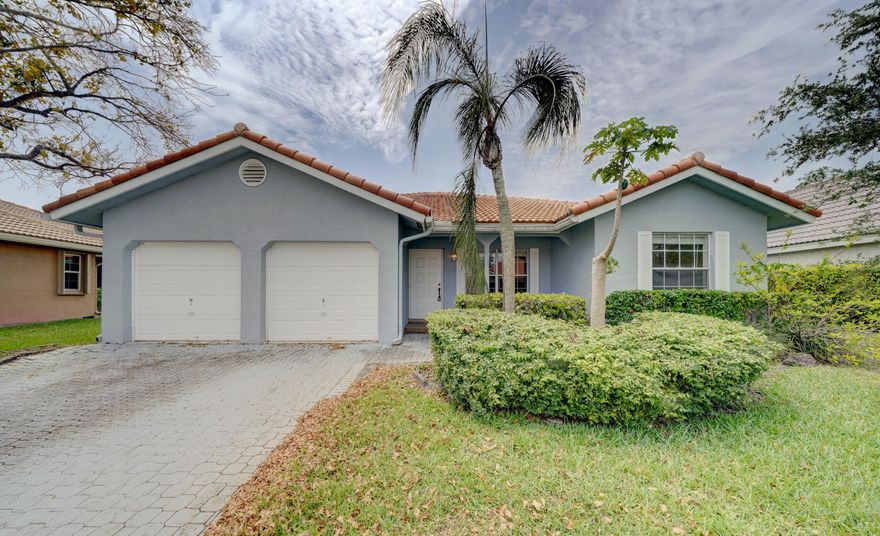 Charming 3 Bedroom, 2 Bath & den room for a 4th bedroom  & 2 car garage This Villa Located in the Community of Springs Hamlet Villas! This Home Features Split Floor Plan, Tile Flooring in Living Areas, Master Bedroom With Walk-In Closet, Lamanite  in Bedrooms, Vaulted Ceilings, Paver Driveway, Screed  patio Spacious Backyard.  LOW HOA includes lawn maintenance & common areas. Walking distance to Community pool. Conveniently located near Coral Square Mall, Sawgrass Expwy, shopping, dining and great schools. Adjacent to Cypress Park with jogging paths, playground, soccer fields, basketball courts and water park. Ready to Move-In Condition Roof only 2 years old ,ac 2015 water tank 2018 brand new stove and microwave . Won't last !