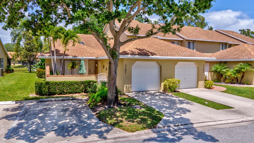 Welcome to this beautifully maintained 2-bedroom, 2-bath GROUND-FLOOR TOWNHOUSE located in Joggers Run community. This home features a 1-car garage and offers serene lake views from a screened-in  patio, perfect for everyday enjoyment.  Inside you'll find a bright and open living space along with a functional kitchen equipped with well-maintained appliances. The home also includes a  washer and dryer, plus a newer AC system. The HOA maintains the roofs.  Residents enjoy  access to a variety of amenities, including a community pool, clubhouse, tennis courts, basketball court and playground. Super convenient location close to shopping, dining, schools, Okeeheelee Park, with easy access to major roadways and the airport. This home combines comfort and convenience.