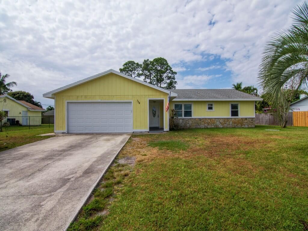 Photo of 134 SE Whitmore Drive, Port Saint Lucie, FL 34984 (MLS # R11079622)
