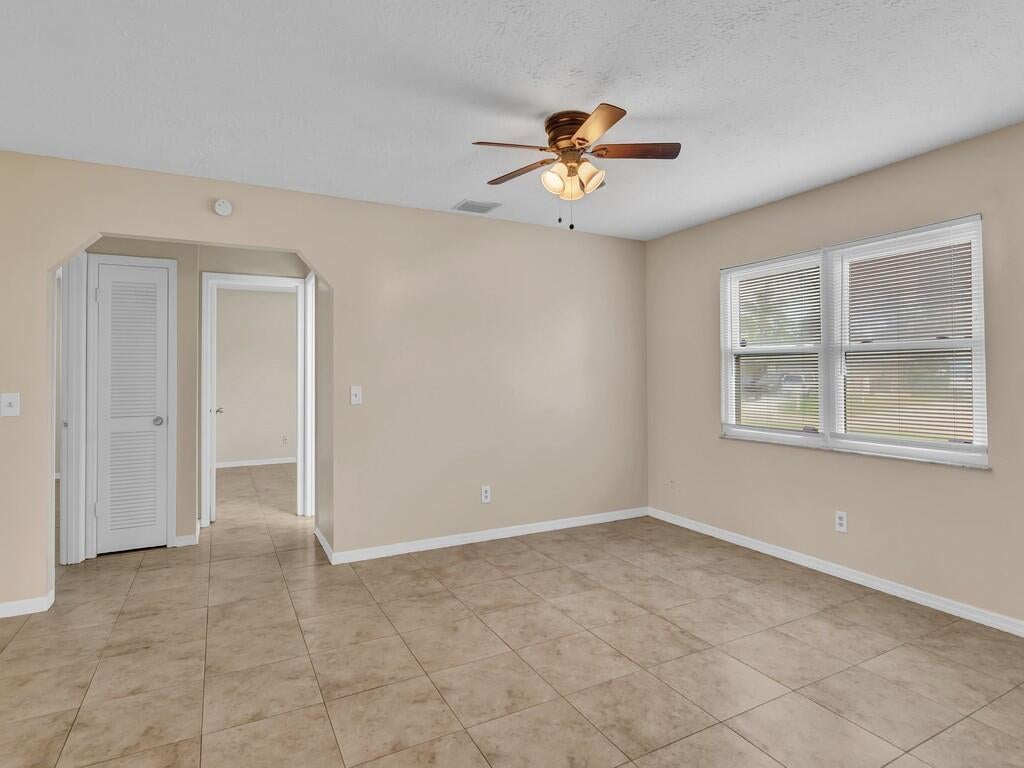 Photo of 134 SE Whitmore Drive, Port Saint Lucie, FL 34984 (MLS # R11079622)