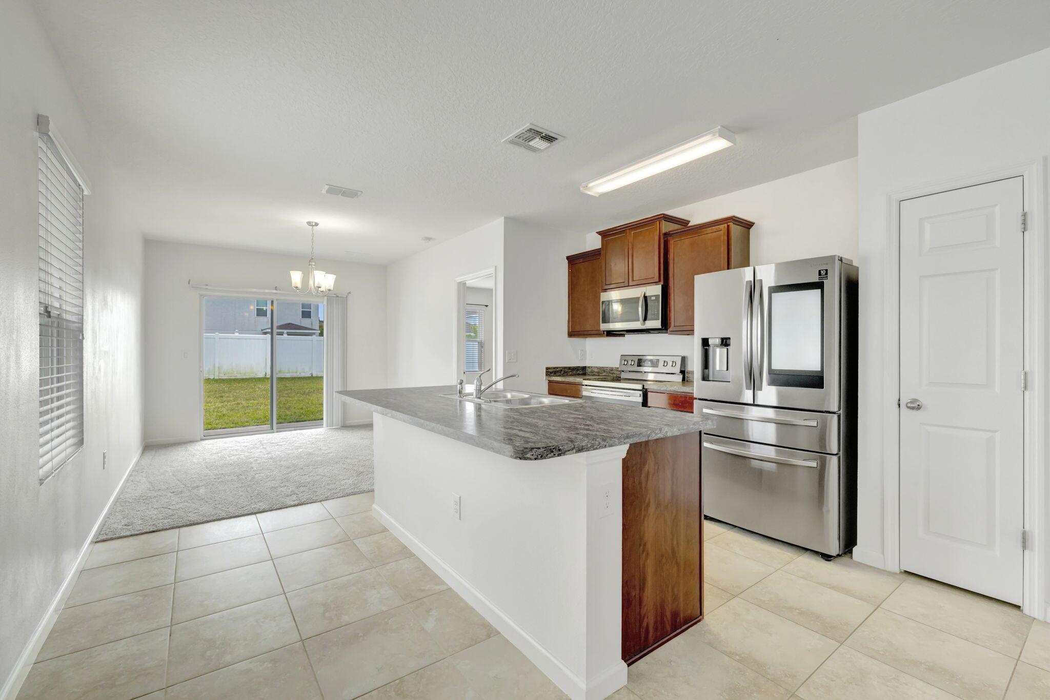 $299,000 for a 3 Bedroom 2 Bath home in Victoria Parc Manors, complete with Laundry Room with Full Size Washer Dryer and 2-Car Garage! The Kitchen features Wood Cabinetry and Stainless Steel Appliances. The spacious Master Suite includes an Ensuite Bathroom with a Shower/Tub combo. Enjoy living near the heart of Tradition, where shopping, dining, and entertainment are just a short walk or bike ride away. Victoria Parc Manors offers a low-maintenance lifestyle, with Cable, Internet, Lawn Care, Exterior Pest Control included! This could be your next home!