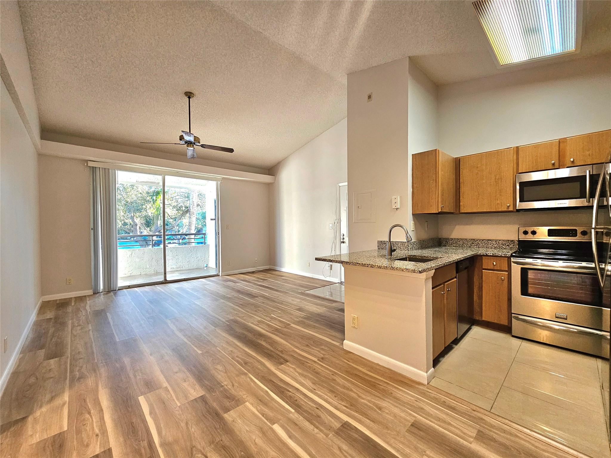 LOVELY, CLEAN ONE BEDROOM *CORNER UNIT *VAULTED CEILINGS * BRAND NEW WASHER & DRYER IN UNIT *NEW FLOORING *STAINLESS STEEL APPLIANCES *BEDROOM LARGE ENOUGH FOR KING BED *WALK-IN CLOSET *BALCONY WITH STORAGE CLOSET & WATER VEIW *LOTS OF AMENITIES...INCLUDING RESORT LIKE POOL, TENNIS COURTS, SAND VOLLEYBALL, BRAND NEW WORK OUT FACILITY AND OUTDOOR RACQUETBALL COURTS. THERE ARE 5 BEAUTIFUL PONDS AND PLENTY OF GREEN SPACE. THERE IS AMPLE AMOUNT OF GUEST PARKING FOR FAMILY & FRIENDS *YOUR ACROSS THE STREET FROM THE COCONUT CREEK COMMUNITY CENTER AND THE NEWLY RENOVATED WINDMILL PARK. YOU ARE ALSO CLOSE TO GROCERY, SHOPPING, BANKS, SCHOOLS AND THE TURNPIKE TO MAKE LIFE A LITTLE MORE CONVENIENT....YOUR NEW PLACE TO CALL HOME AWAITS YOU!!!