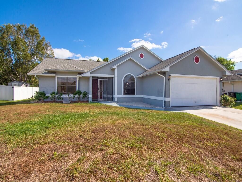 Photo of 1442 SW Glastonberry Avenue, Port St Lucie, FL 34953 (MLS # R10874694)
