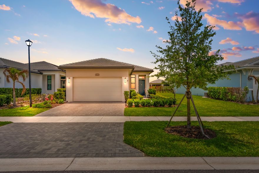 Welcome to luxury living in PGA Verano! This 2024 Alison model offers modern elegance and everyday comfort in a sought-after Port St. Lucie community. Featuring a spacious 3-bedroom layout, it's perfect for guests or a home office. Enjoy a beautifully upgraded interior with a designer backsplash, stylish lighting, and elevated cabinetry and countertops. The open-concept design seamlessly connects the kitchen, dining, and living areas—ideal for entertaining. Residents enjoy Club Talavera's clubhouse, fitness center, indoor lap pool, tennis, pickleball, and year-round social events. Move-in ready and made for resort-style living!