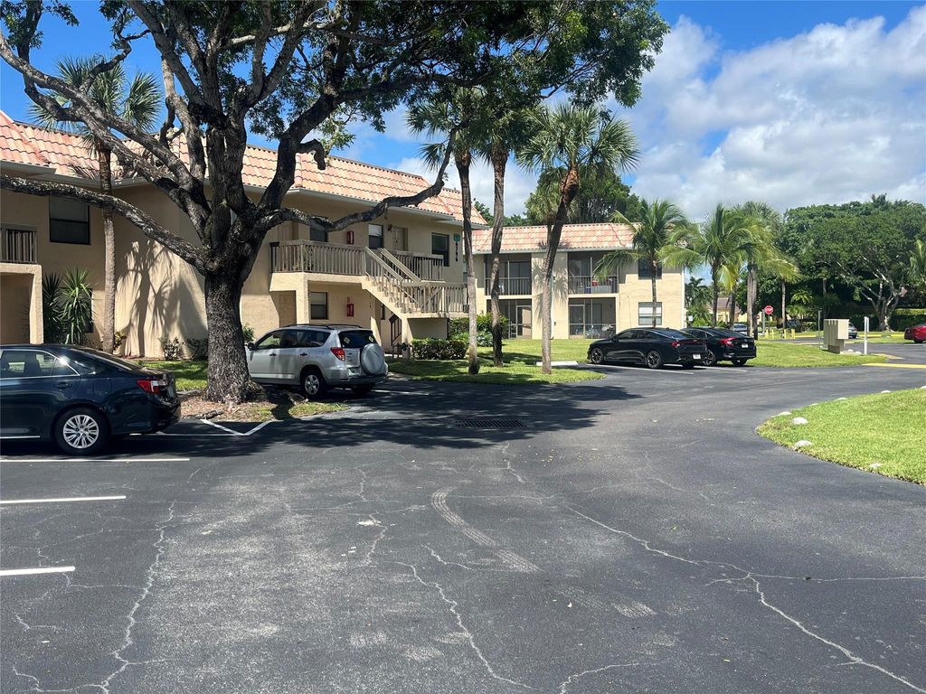 Photo of 6796 Palmetto Cir #202, Boca Raton, FL 33433 (MLS # F10526218)