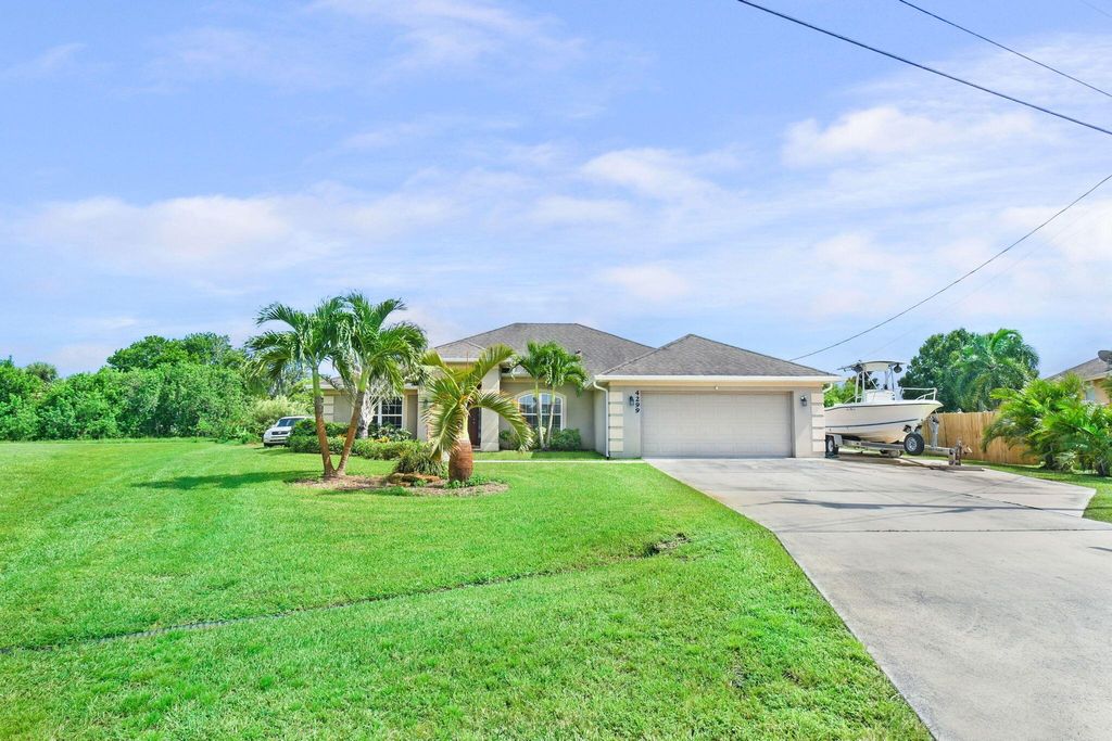 Photo of 4299 SW Mccrory Street, Port Saint Lucie, FL 34953 (MLS # R11023761)