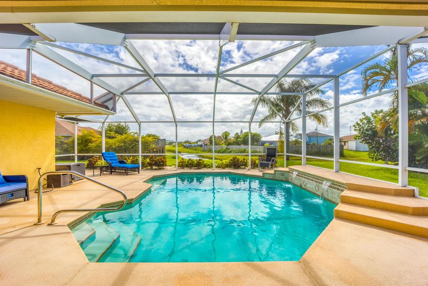 This Solid,4/3,CBS, Pool Home is hands down the most Gorgeous & Move In Ready Retreat we have been in! Impact Windows, Plantation Shutters, HEATED POOL, plus more. Each bedroom is spacious, and one can be a separated suite for multi-generational living, if desired. The Primary Bedroom has two walk in closets, separate tub & large shower & sliders to the pool. A large covered lanai is the icing on the cake, with an OUTDOOR KITCHEN & room for all your family celebrations! Circular Paver driveway and paver walkways all around the home. I mean this is a great house! Close to Parks, Fine Restaurants, Live Theaters, Beaches and more! Call today to come see!