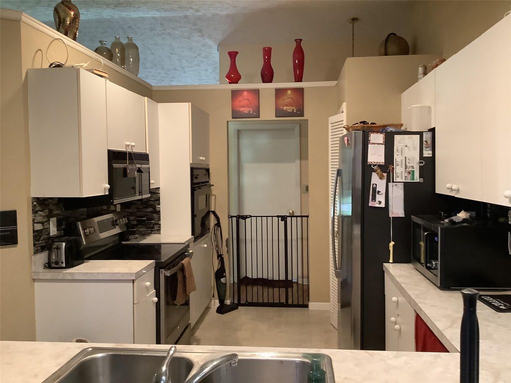 Photo of 449 SW Aster Road, Port Saint Lucie, FL 34953 (MLS # F10512705)