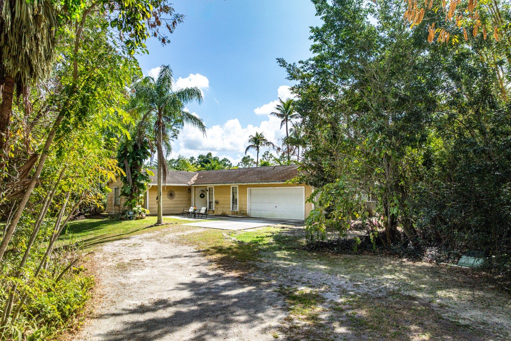Photo of 14616 N 92nd Court N, West Palm Beach, FL 33412 (MLS # R11064069)