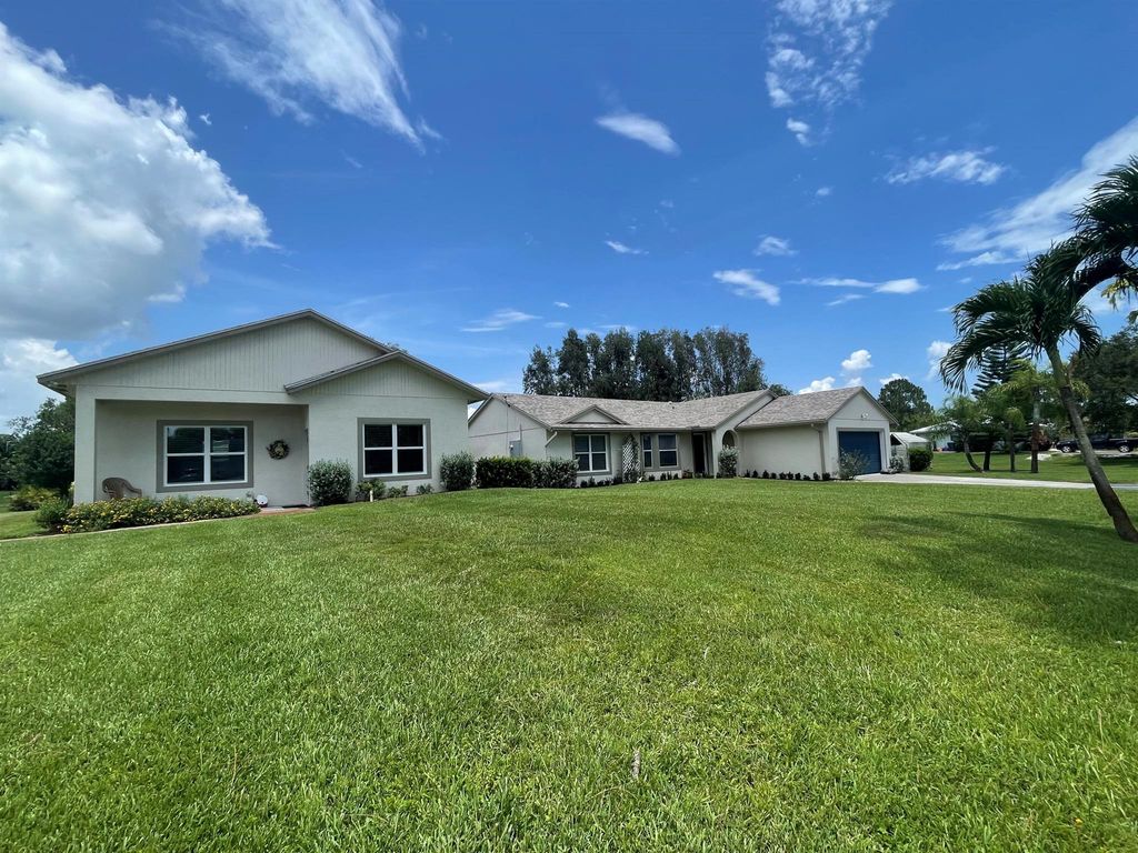 Photo of 13963 78th Place N, West Palm Beach, FL 33412 (MLS # R10904279)