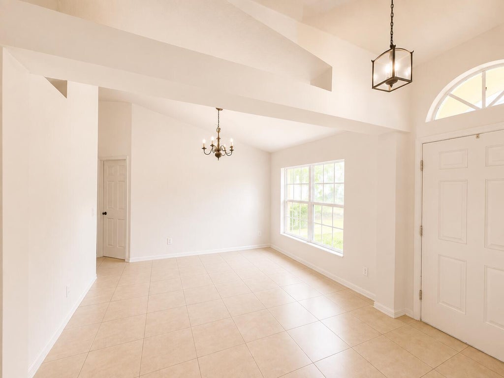 Photo of 1061 SW Coleman Avenue, Port Saint Lucie, FL 34953 (MLS # B26061485)